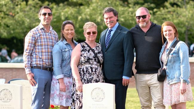 Troy Marinier, left, Michaelle Marnier, Margaret Claxton, Robert Claxton, Luke Claxton and Chelsea Claxton, relatives of Maurice Claxton at his grave at the Pheasant Wood cemetery in Fromelles. Picture: Jacquelin Magnay