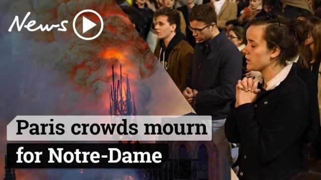 Notre Dame fire: Parisians sing hymns to mourn the iconic cathedral