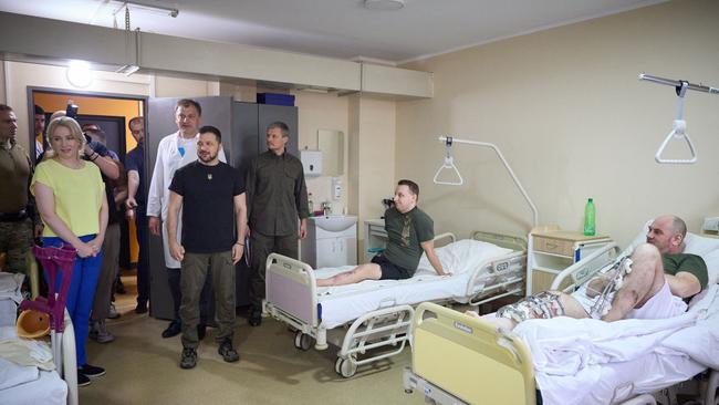 Ukrainian President Volodymyr Zelenskyy visiting wounded Ukrainian servicemen in a military hospital in Ivano-Frankivsk region, western Ukraine. Picture: Handout / AFP