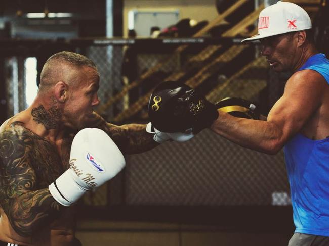 Ross Pearson trains with Jamie Pittman. 