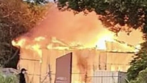 A charity op-shop's storage shed has gone up in flames in an overnight fire. Picture: Bayside Transformations