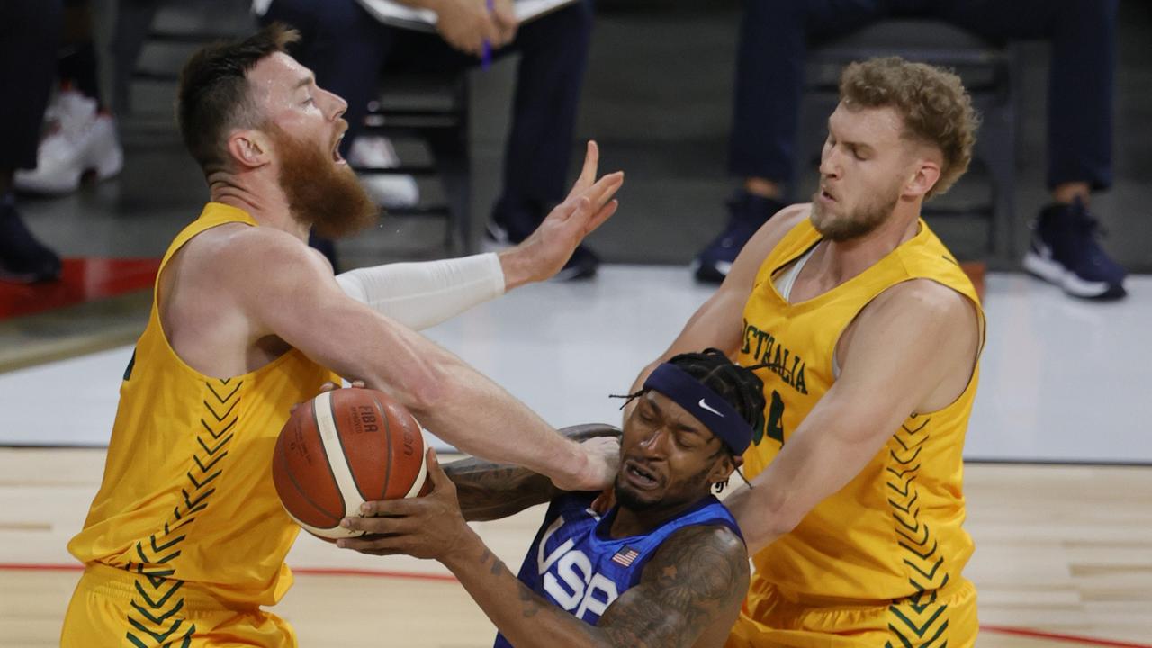 USA star Bradley Beal (C) has been placed under COVID-19 health and safety protocols – just two days after playing against the Australian Boomers.