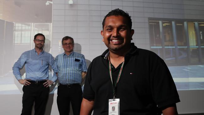 Dr Gary Grant, Professor Harry McConnell and Dinesh Palipana at the Griffith University virtual reality pharmacy laboratory. Picture: Scott Fletcher