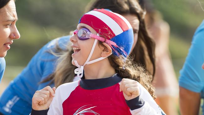 Copacabana competitor Quentin Furey is all smiles before the beach wade at the Surf Life Saving Central Coast Inclusive Branch Carnival at Copacabana Beach. Picture: Troy Snook