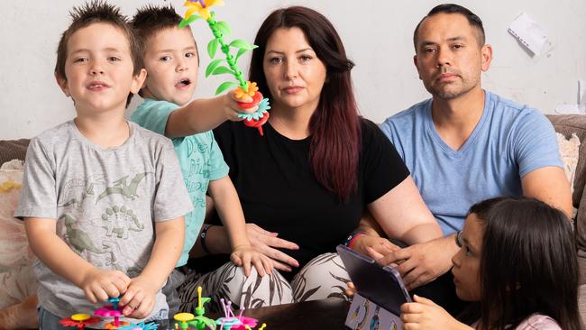 January 8, 2025: Photo: L-R Leo (5), Max (5), Ellen, Charles and Emily (7) Mitchell.  Max, one of Ellen's children has had to wait over a year for an assessment at the Women's and Children's Hospital - Child Development Unit. Picture: Tim Joy