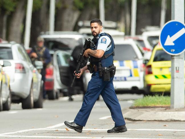 An armed police officer is seen following a shooting at the Masjid Al Noor mosque. Picture: AAP