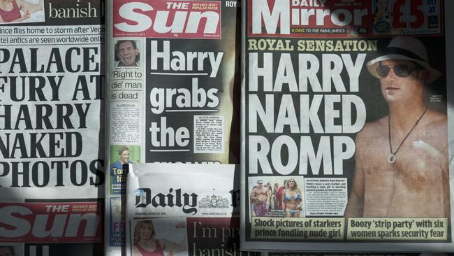 British daily newspapers photographed in London on August 23, 2012 show the front-page headlines after nude photographs of Prince Harry cavorting with friends on holiday in Las Vegas emerged. Picture: AFP