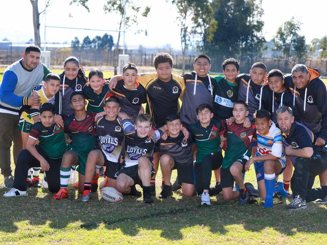 PENRITH PRESS/AAP. Western Raptors pose for photographs at Hickeys Lane Reserve in Penrith. Penrith, Saturday 3 August, 2019. The Western Raptors took out the 2019 under-12 junior state rugby championship. (AAP IMAGE / Angelo Velardo)