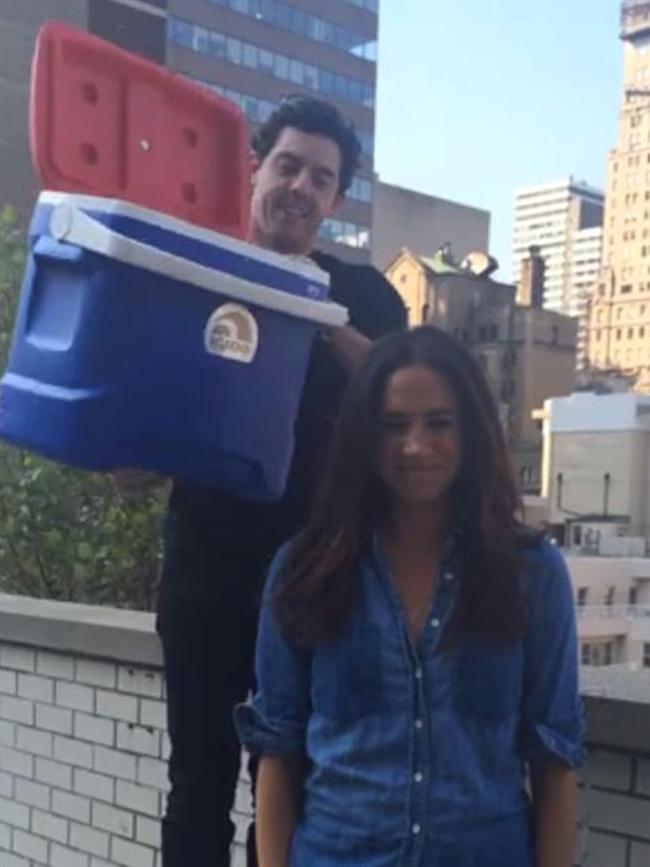 Rory McIlroy and actor Meghan Markle take part in the ice bucket challenge in 2014. Picture: supplied