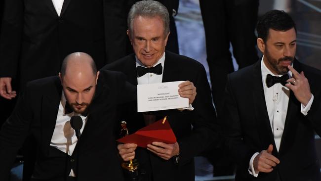 La La Land producer Jordan Horowitz, actor Warren Beatty and Jimmy Kimmel at the end of last year’s ceremony. Picture: AFP