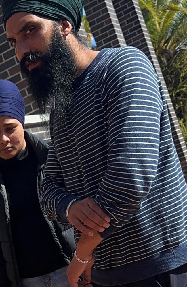 Lovepreet Singh (right) outside Lismore Courthouse.