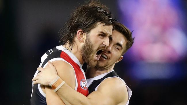 MELBOURNE, AUSTRALIA - JULY 27: Josh Bruce (left) and Jade Gresham of the Saints celebrate during the 2019 AFL round 19 match between the St Kilda Saints and the Melbourne Demons at Marvel Stadium on July 27, 2019 in Melbourne, Australia. (Photo by Michael Willson/AFL Photos via Getty Images)