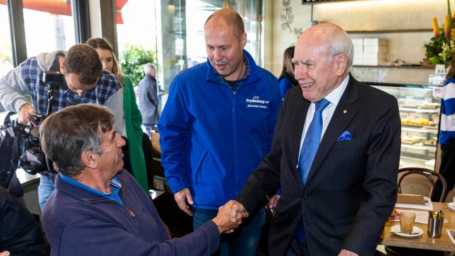 Former prime minister John Howard campaigning with Treasurer Josh Frydenberg in Kooyong on Tuesday. Picture: Aaron Francis / The Australian
