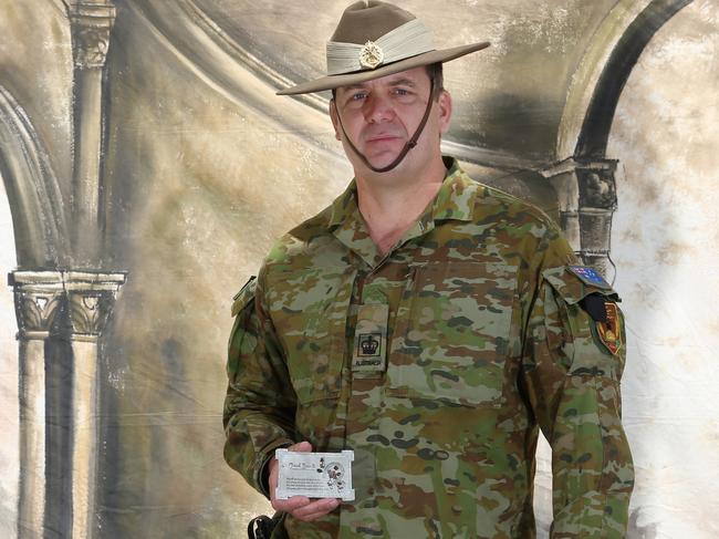 Adrian Ross with his family’s lucky charm which has been taking on every operation since WW1 by a family member who has served. Picture Gary Ramage