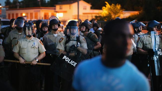 Critics slam Ferguson police use of military weaponry as Twitter users ...