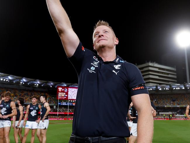 Michael Voss waves to Carlton supporters after Carlton’s stunning win over Brisbane at the Gabba, the ground he captained the Lions on in his playing days. Picture: Dylan Burns/AFL Photos via Getty Images.