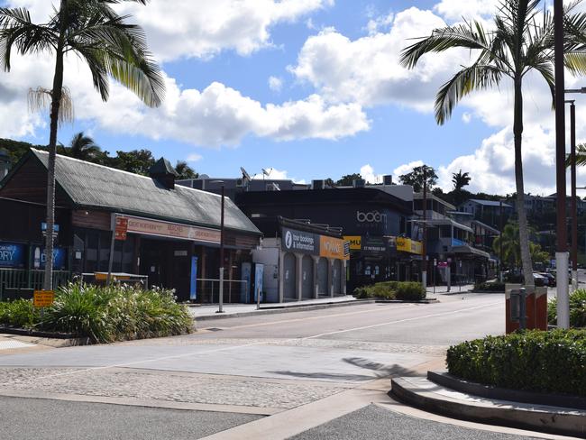 The deserted Airlie Beach Main Street.