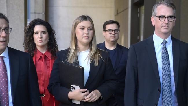 Brittany Higgins (centre) is being sued for defamation by her former boss Senator Linda Reynolds. Picture: NewsWire / Jeremy Piper