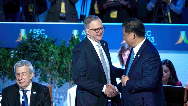 Anthony Albanese greets Xi Jinping during the APEC leaders retreat.