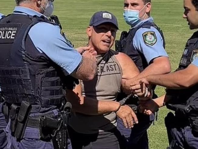 Dog walker Dimitri Gabriel was charged with intimidation after allegedly verbally abusing passers-by in a Sydney dog park. He was tackled to the ground by police in footage of the arrest. Picture: Supplied