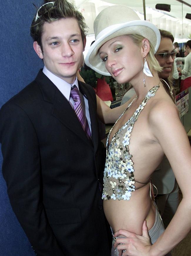 Australian Idol contestant Rob Mills and socialite Paris Hilton at the 2003 Melbourne Cup.