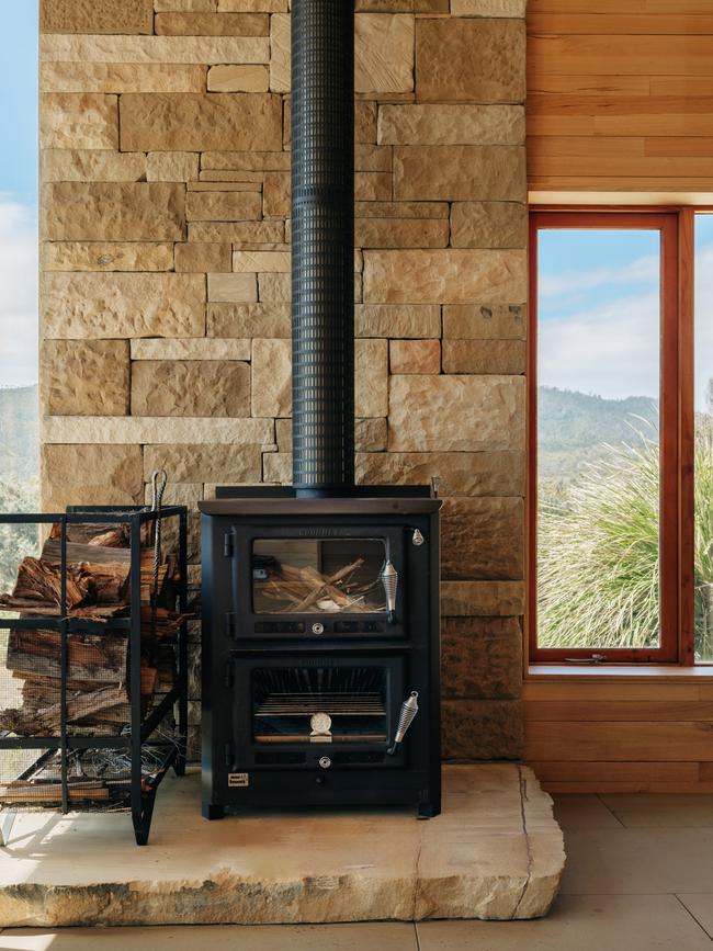 The wood stove in the Roaring Beach House. Picture: Adam Gibson