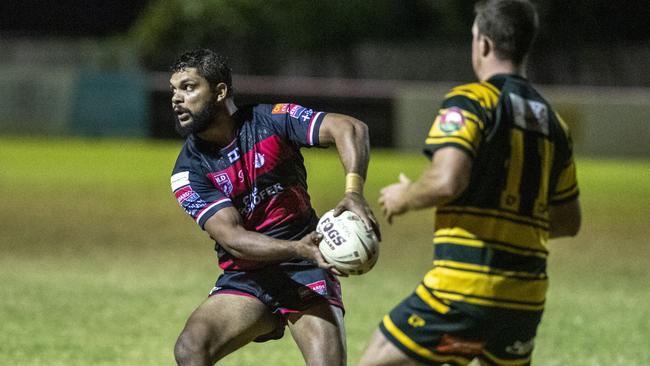 Dwayne Duncan fires off a pass. Picture: Nev Madsen.