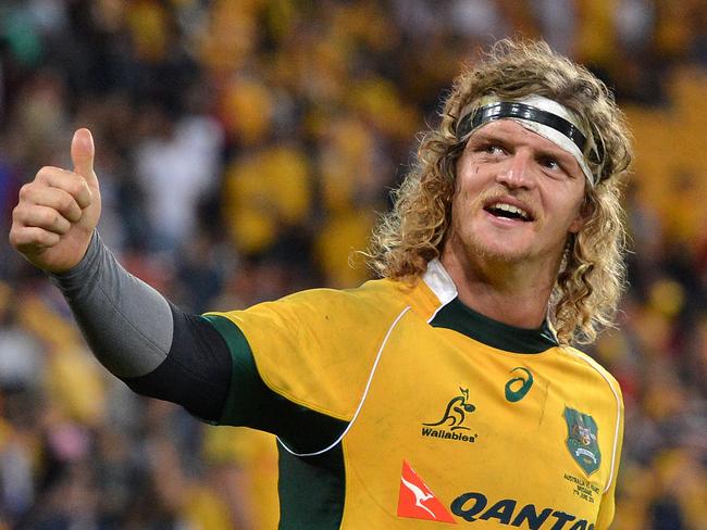 Nick Cummins of the Wallabies celebrates victory over France at Suncorp Stadium in 2014.