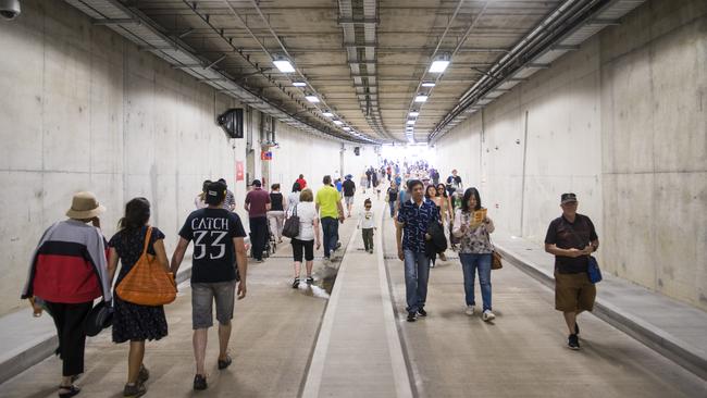 People walk through the new O-Bahn tunnel under Rymill Park before it’s opened. Picture: Nick Clayton.