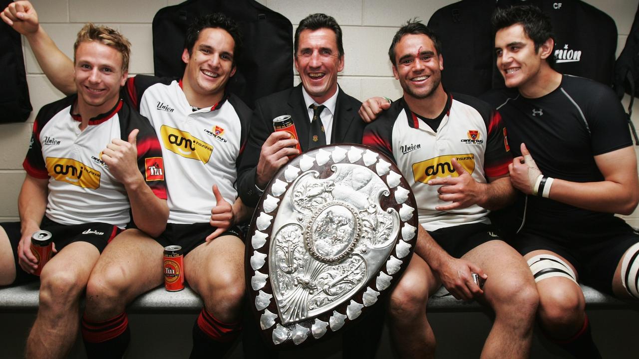 Canterbury coach Rob Penney and his players celebrate with the Ranfurly Shield in 2007.