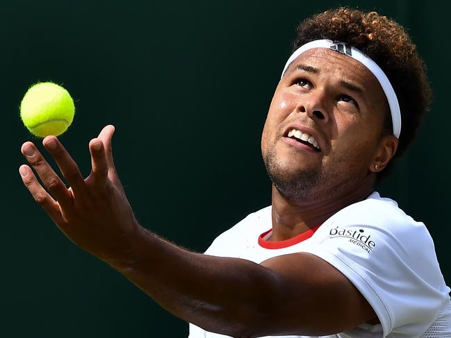 France's Jo-Wilfried Tsonga cleaned the floor with Bernard Tomic.