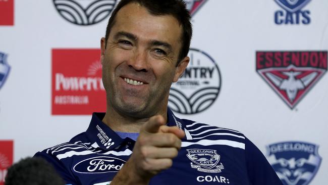 Geelong coach Chris Scott share a laugh in the build up to the Essendon clash.