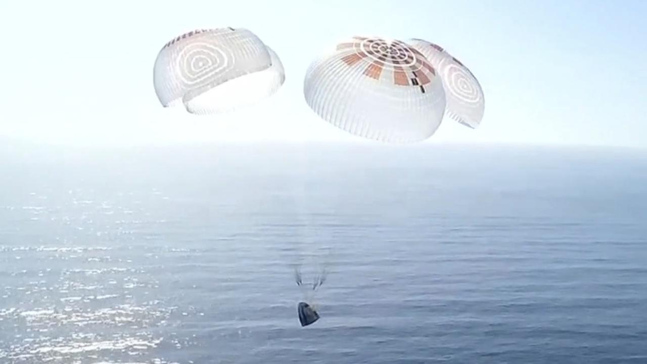 The Dragon capsule safely returned to Earth after orbiting over the North and South Poles. Picture: SpaceX via AP