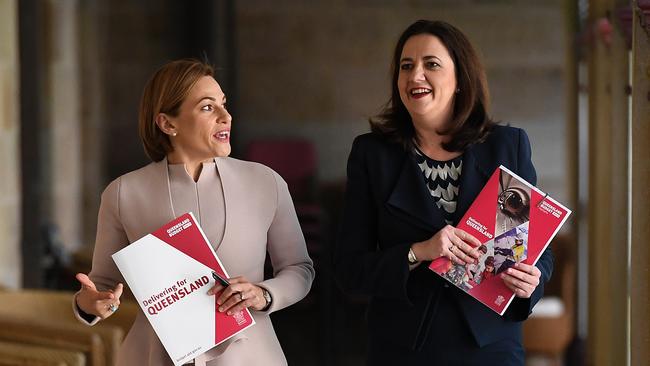 Queensland Premier Annastacia Palaszczuk (right) and Treasurer Jackie Trad arrive for a press conference in the state budget media lockup at Parliament House (AAP Image/Dan Peled)