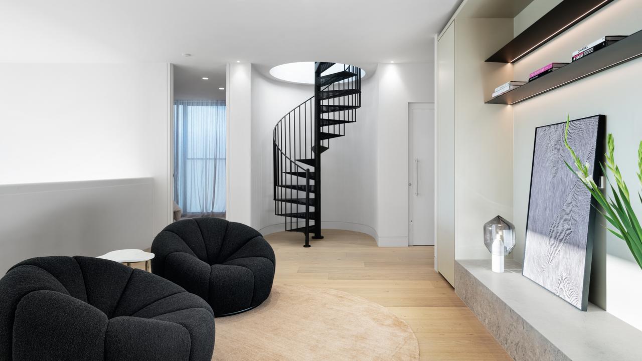 The master bedroom includes a Molteni designer dressing room and marble ensuite with a freestanding bath.