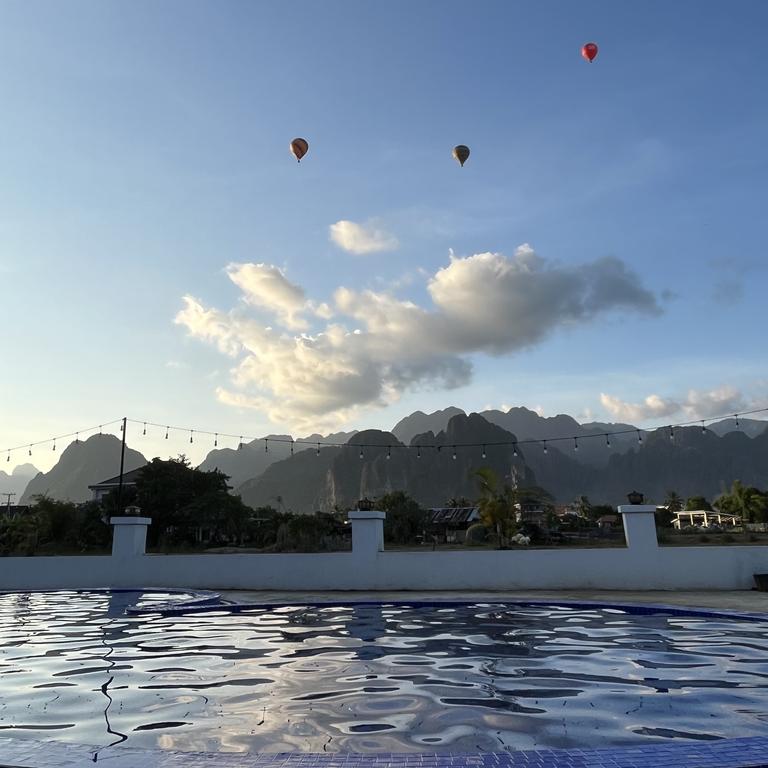 Enjoy a swim in your hotel pool beneath the hot air balloons – not bad for just $20 per night.