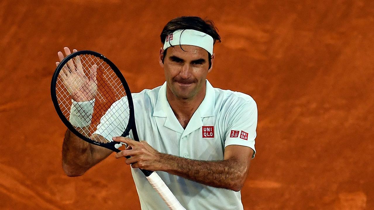 Roger Federer celebrates a winning return to clay.