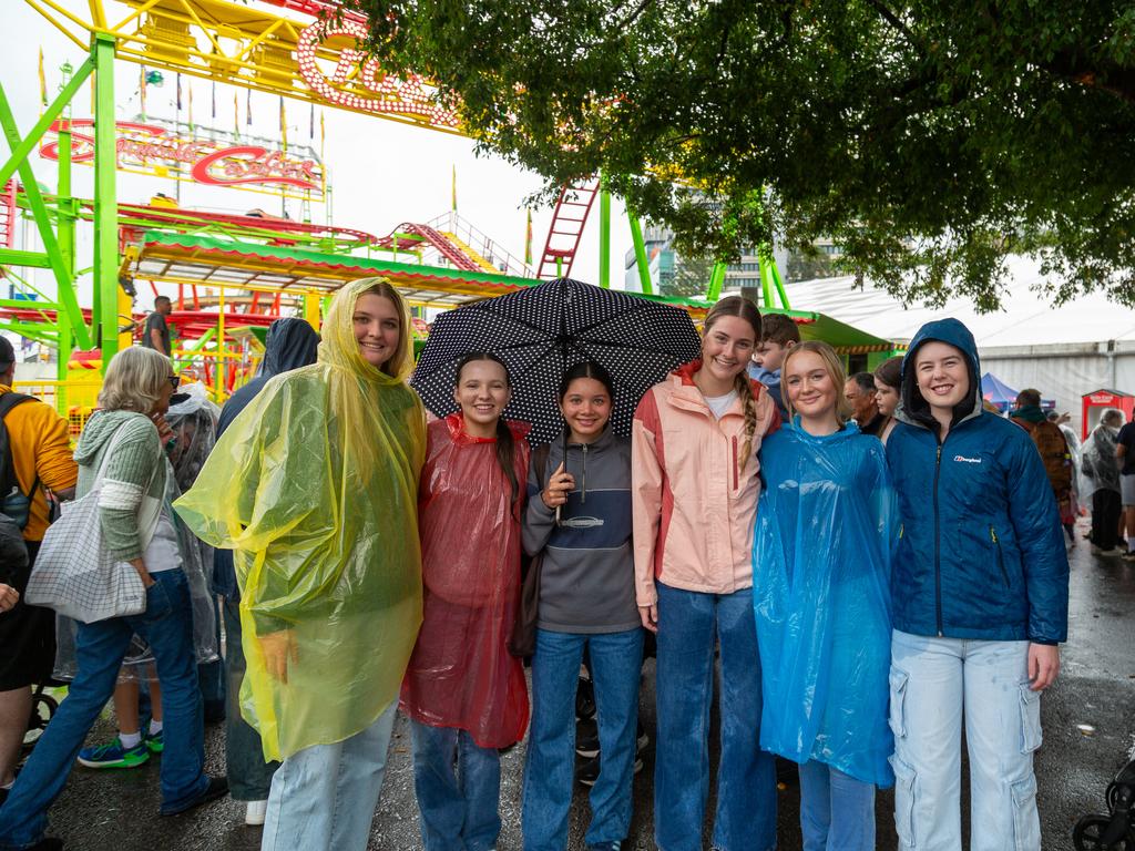 51 pics: Ekka-goers brave big wet on day 3 | The Courier Mail