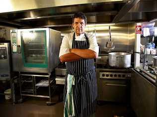 Fig Jam Catering owner Jason Davidson is taking Burleigh Brewing to court over its use of the Fig Jam trademark for one of its brews. Pics of Jason in his shop/kitchen with some of his products - his business has been operating since 2005. Picture: MARC ROBERTSON