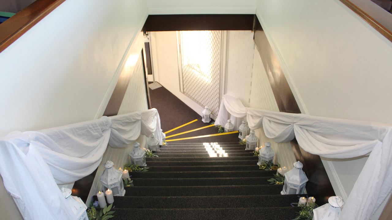 The stairway up to the Rowers on the River function room was decorated with lanterns and candles for the 2023 Gin Gin State High School Formal.