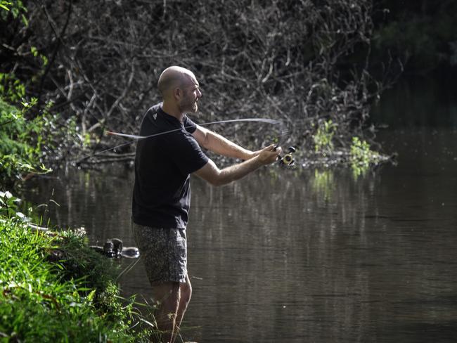 Tourist fishing in local Jamieson river. Feature on getting tourist back to the country after Victorian fires. Picture: Tony Gough