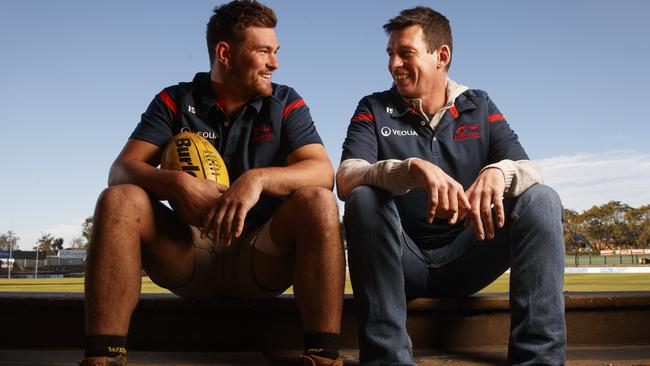 Magarey Medallist Mitch Grigg, left, and his father Chris have symbolised Norwood’s mantra of strength in adversity. Picture: Matt Turner.