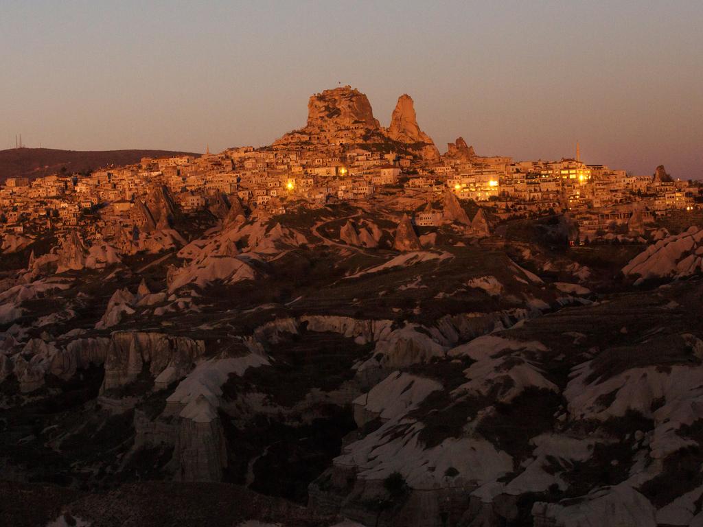 Morning sunlight illuminates the town of Uchisar on April 17, 2016 in Nevsehir, Cappadocia, Turkey. Picture: Getty