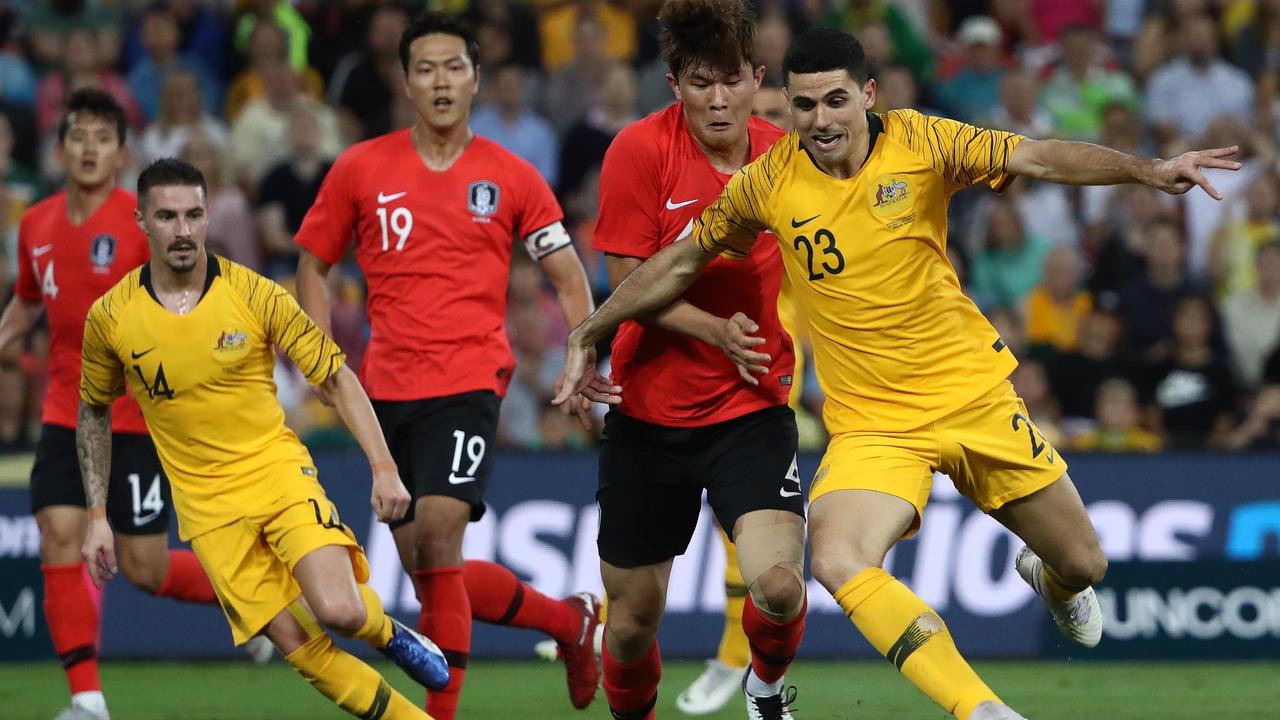 Tom Rogic returns to the Socceroos squad for the first time since January.