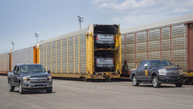 An all-electric Ford F-150 prototype during a capability test. The battery-powered truck successfully towed more than 1.25 million pounds of rail cars and trucks during the test.