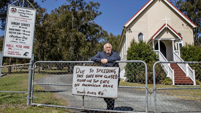 Traffic woes has forced the Pimpama Uniting Church to lock its front gates after its grave yard was used repeatedly as a rat run. Pastor Trevor Mildren. Picture: Jerad Williams