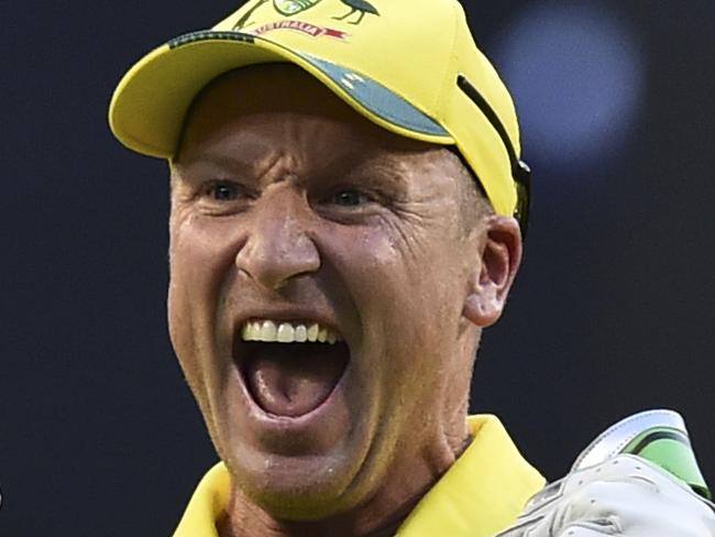 Australia's wicketkeeper Brad Haddin celebrates after catching out England's Jos Buttler during their Cricket World Cup pool A match in Melbourne, Australia, Saturday, Feb. 14, 2015. (AP Photo/Theo Karanikos)