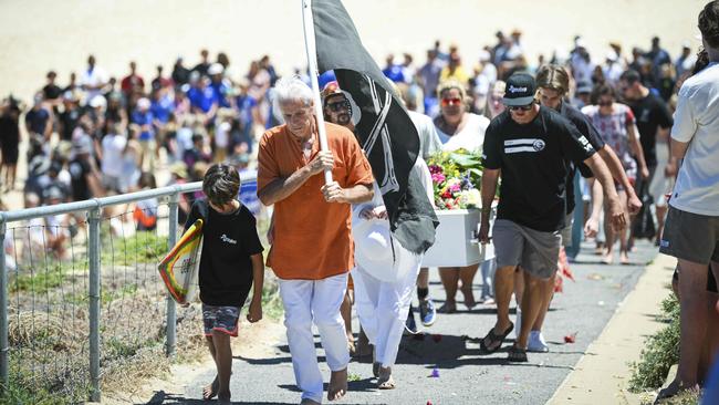 Khai's grandfather leads the pallbearers during the memorial for Khai Cowley at Seaford. Picture: NCA NewsWire / Mark Brake