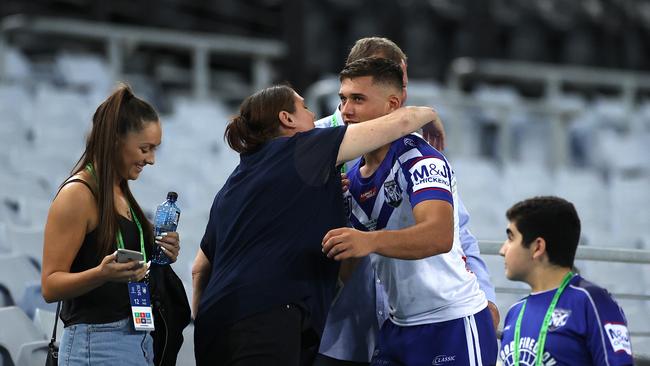 Debutant Jake Averillo with his family at full time after the first NRL match to be played with no crowd due to the COVID-19 virus between the Canterbury-Bankstown Bulldogs and North Queensland Cowboys at ANZ Stadium, Sydney. Picture. Phil Hillyard