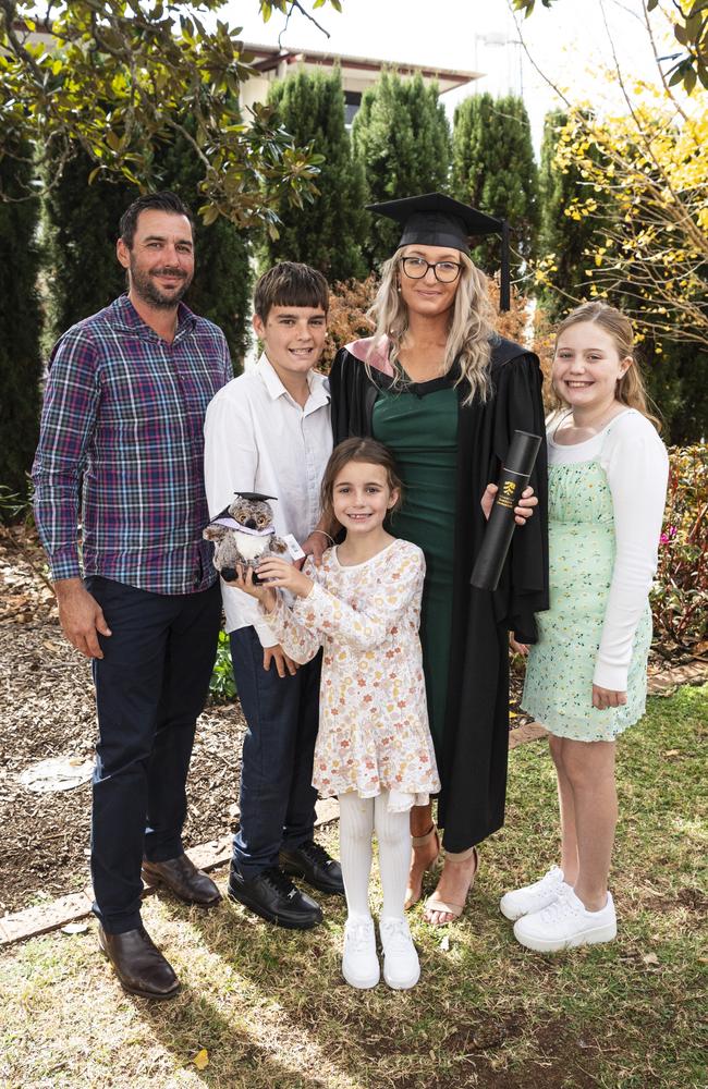 Bachelor of Education (Early Childhood) graduate Georgia Salgado with family (from left) Lachie, Kobi, Zara and Ariana Salgado at a UniSQ graduation ceremony at The Empire, Tuesday, June 25, 2024. Picture: Kevin Farmer